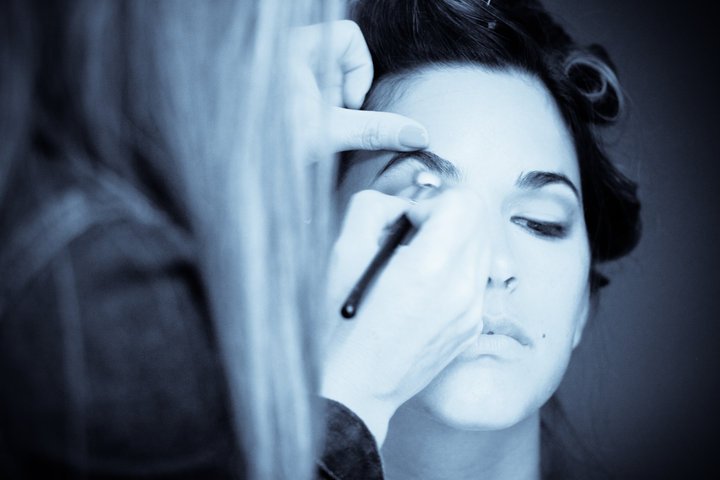 Black & White Image if Model getting makeup done